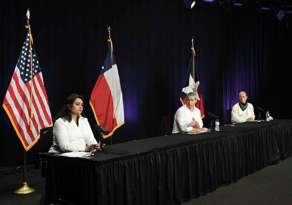 Anita Kurian, chief epidemiologist for the San Antonio Metropolitan Health District, left, Mayor Ron Nirenberg and Bexar County Judge Nelson Wolff speak during the daily city-county coronavirus briefing on Monday, Aug. 17, 2020. Nirenberg said the coronavirus’ overall risk in the community has been downgraded to moderate.