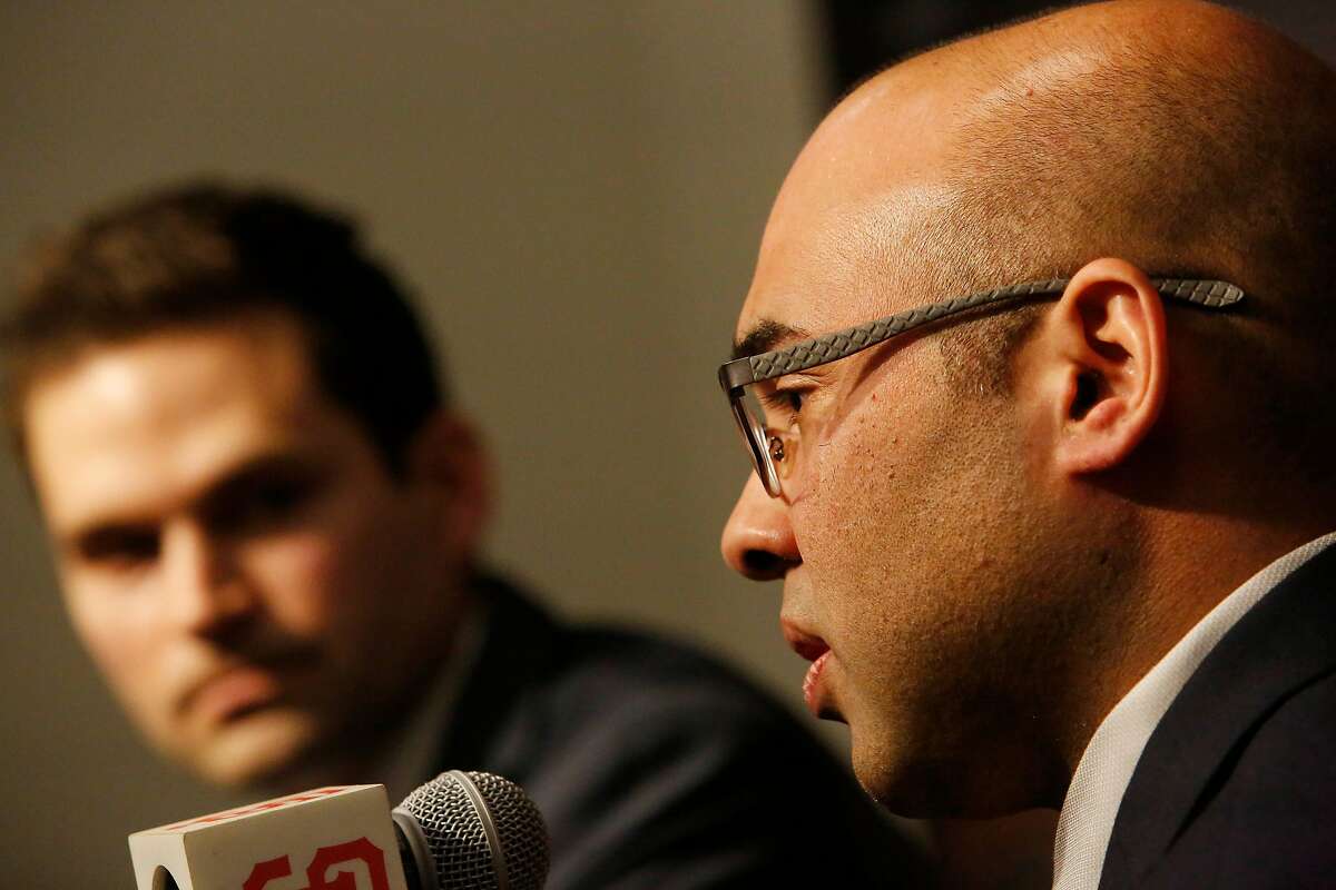 San Francisco Giants' new general manager Scott Harris (left) listens as president of baseball operations Farhan Zaidi (right) speaks during a news conference in the Nick Peters Media Interview Room at Oracle Park on Monday, November 11, 2019 in San Francisco, Calif.