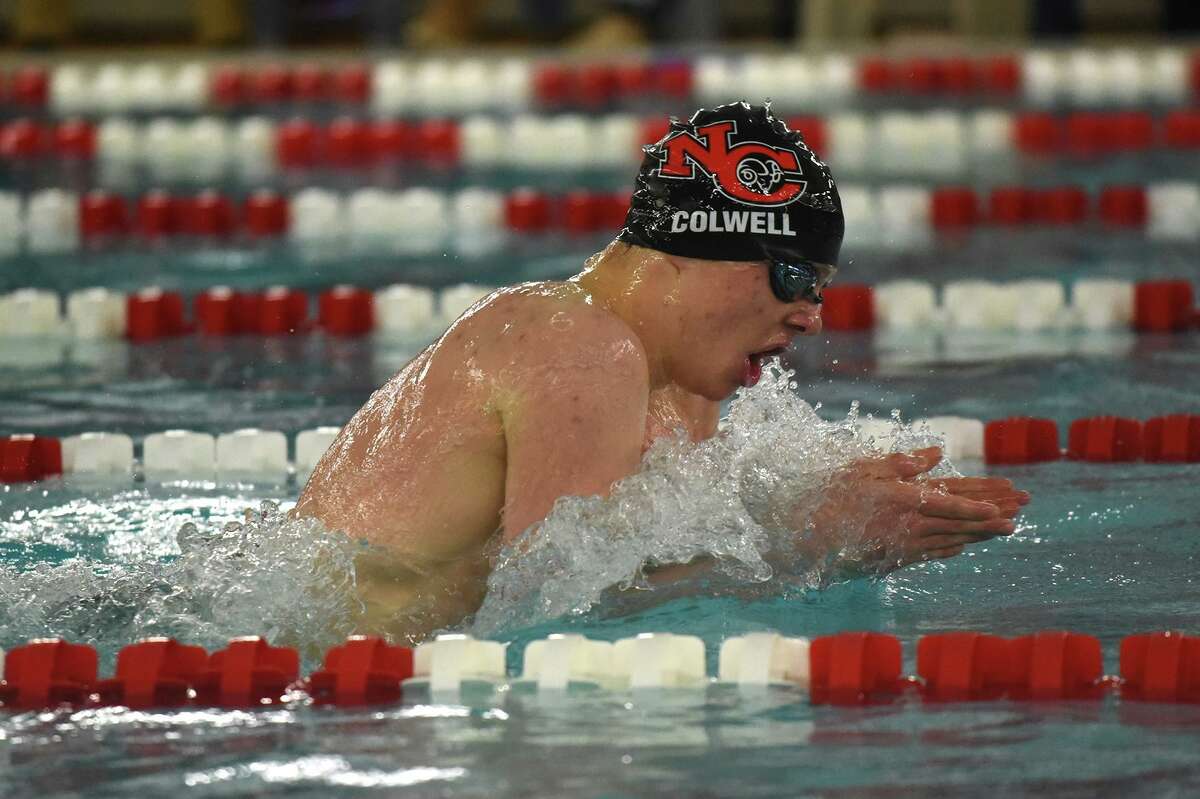 New Canaan’s Patrick Colwell swims to a gold medal in the 200-yard individual medley at the FCIAC swim finals at Greenwich High School on Thursday, Feb. 28.