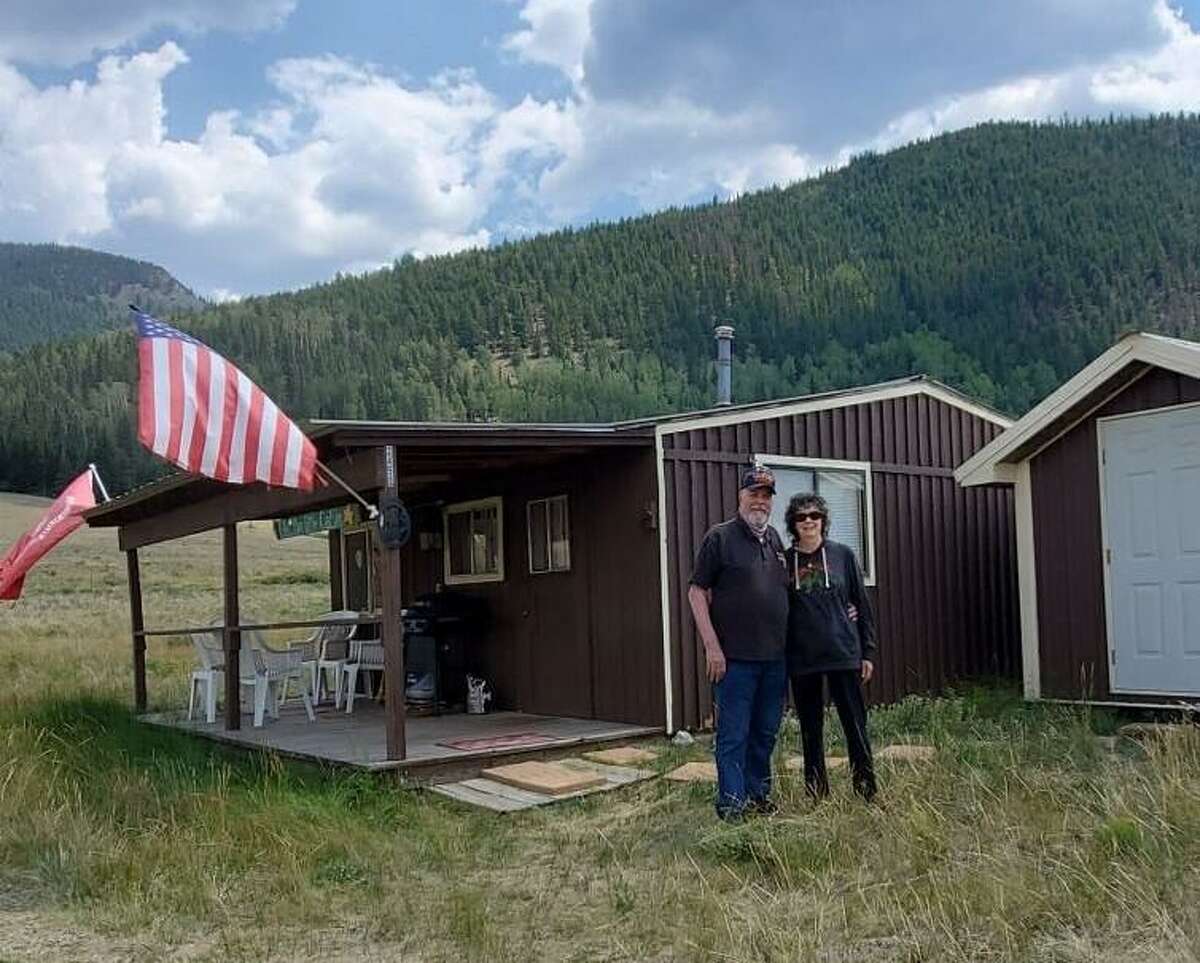 Bill and Stephanie Williams, of Conroe, at their cabin in Creede, Colorado. In late July, Bill Williams killed a 250-pound bear that crashed into the cabin in the middle of the night.