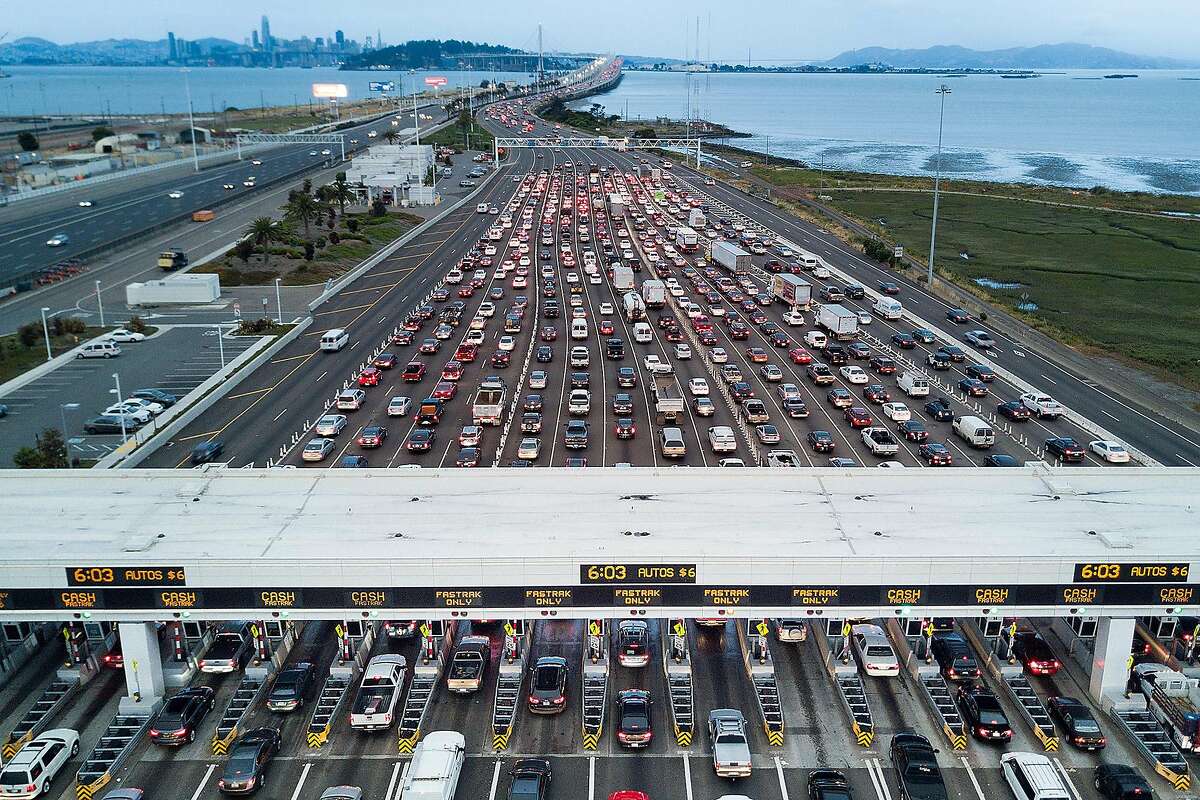 Traffic flows through the Bay Bridge toll plaza on Thursday, June 8, 2017, in Oakland, Calif.