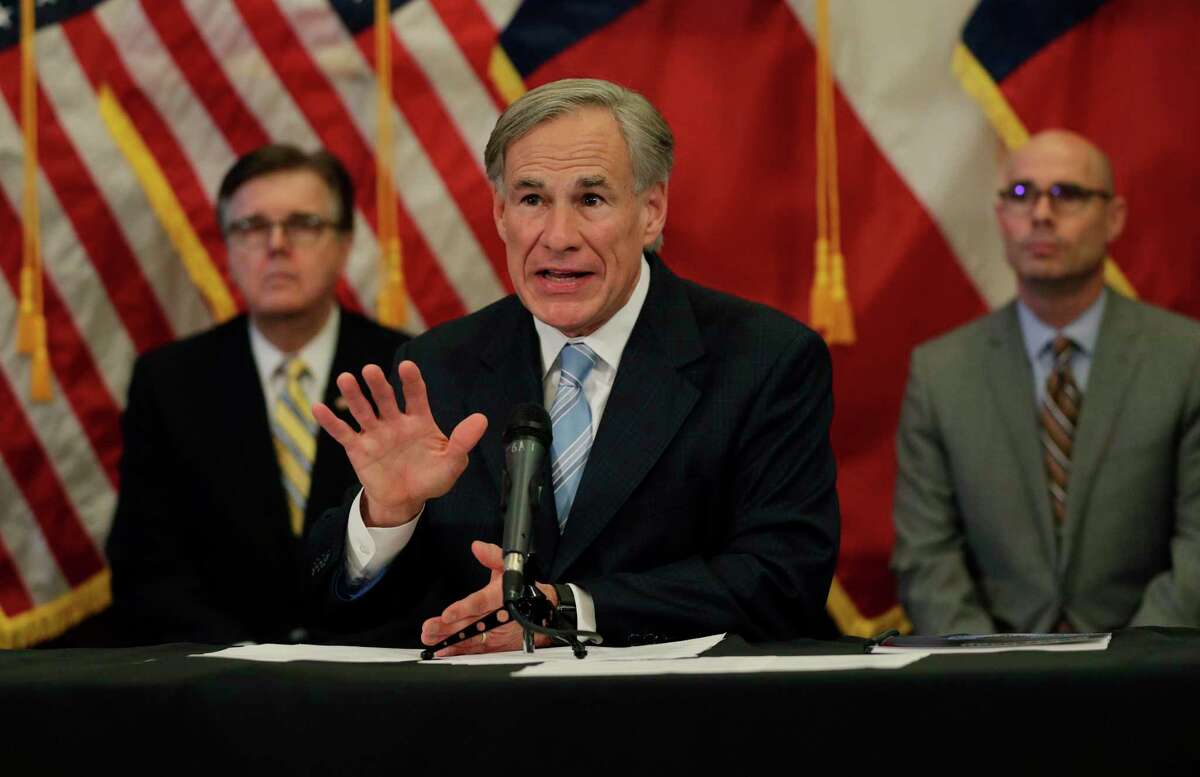 Texas Gov. Greg Abbott, center, with Lt. Gov. Dan Patrick, left, and Texas House Speaker Dennis Bonnen, right, speaks during a news conference where he announced he would relax some restrictions imposed on businesses due to the COVID-19 pandemic, Monday, April 27, 2020, in Austin, Texas. (AP Photo/Eric Gay)