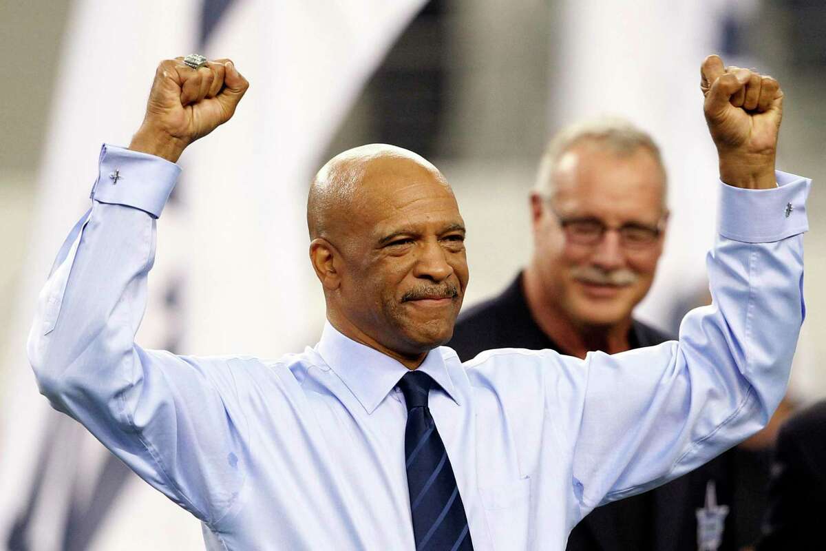 FILE - In this Nov. 6, 2011, file photo, former Dallas Cowboys player Drew Pearson reacts during an induction ceremony into the Cowboys Ring of Honor at halftime of an NFL football game against the Seattle Seahawks in Arlington, Texas. Former Dallas Cowboys wide receiver Drew Pearson was selected Tuesday, Aug. 18, 2020, as the Senior Finalist for the Pro Football Hall of Fame’s Class of 2021. (AP Photo/Jim Cowsert)