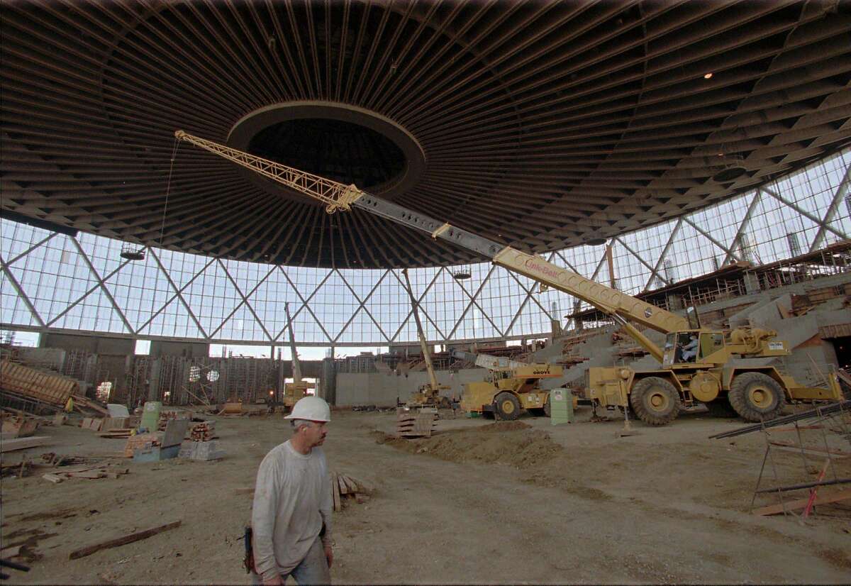 Construction work continues on the interior of the Oakland Coliseum Arena Wednesday, Feb. 26, 1997, in Oakland, Calif. Upon the expected completion date of Nov. 8, 1997, in time for the Golden State Warriors' opening basketball game, the renovated Arena will seat 19,200 people, including the addition of 72 private luxury suites, becoming one of the premier arenas in the NBA. (AP Photo/Ben Margot)