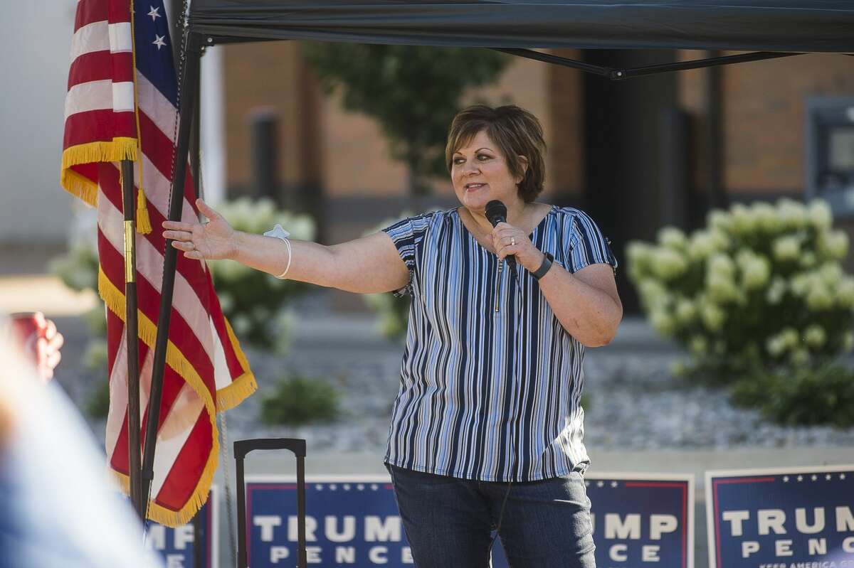 FILE PHOTO: Midland County Republican Party Chair Cathy Leikhim addresses the crowd during a Cops for Trump MAGA Meet-Up Tuesday, Aug. 18, 2020 on Ashman Street in Midland. (Katy Kildee/kkildee@mdn.net)