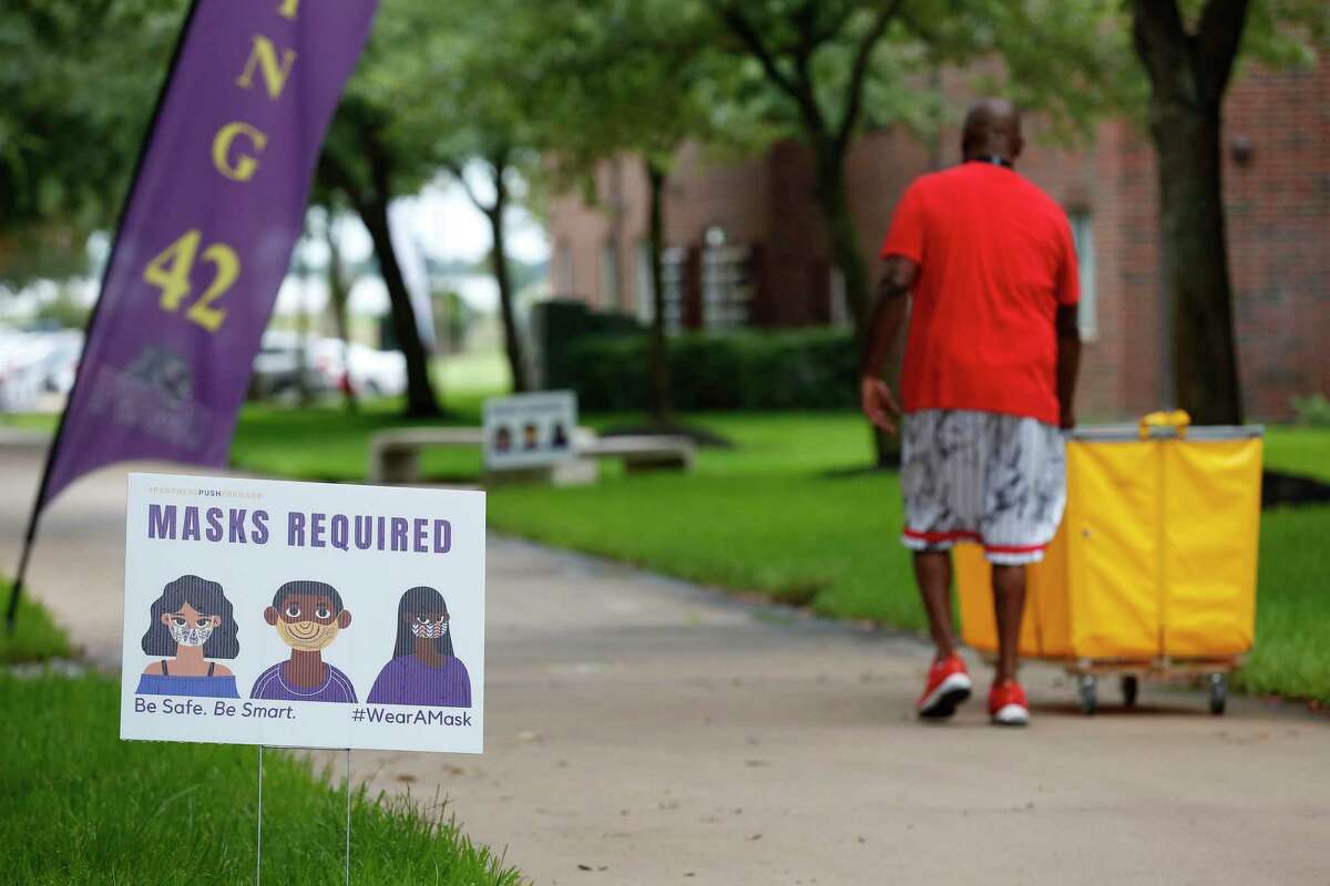 Signs for social distancing and masks were all over campus as students moved into their rooms at Prairie View A&M University Monday, Aug. 17, 2020, in Prairie View.