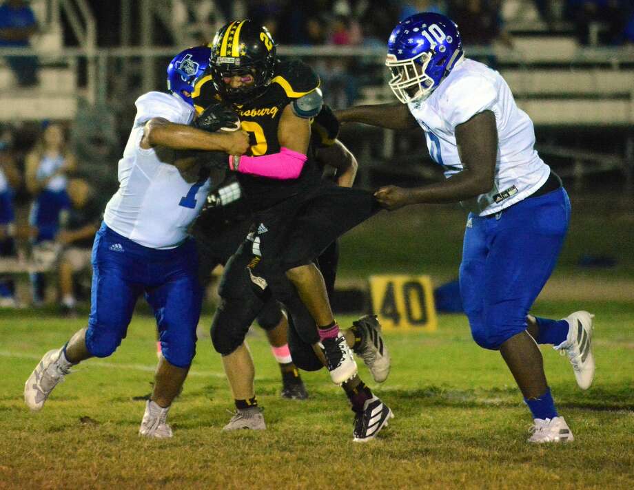 Kaden Parraz (with ball) and the Petersburg Buffaloes will have an extremely difficult non-district schedule with four games against top-flight six-man football teams this season. Photo: Nathan Giese/Planview Herald