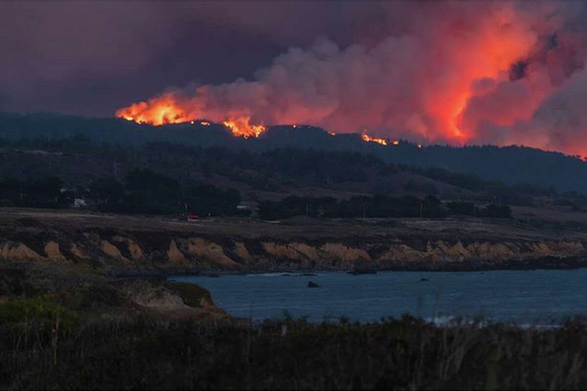 A wildfire burns near Pescadero and the San Mateo coast. It is one of the fires, known collectively as the CZU Lightning Complex Fire, that are burning in San Mateo and Santa Cruz counties.