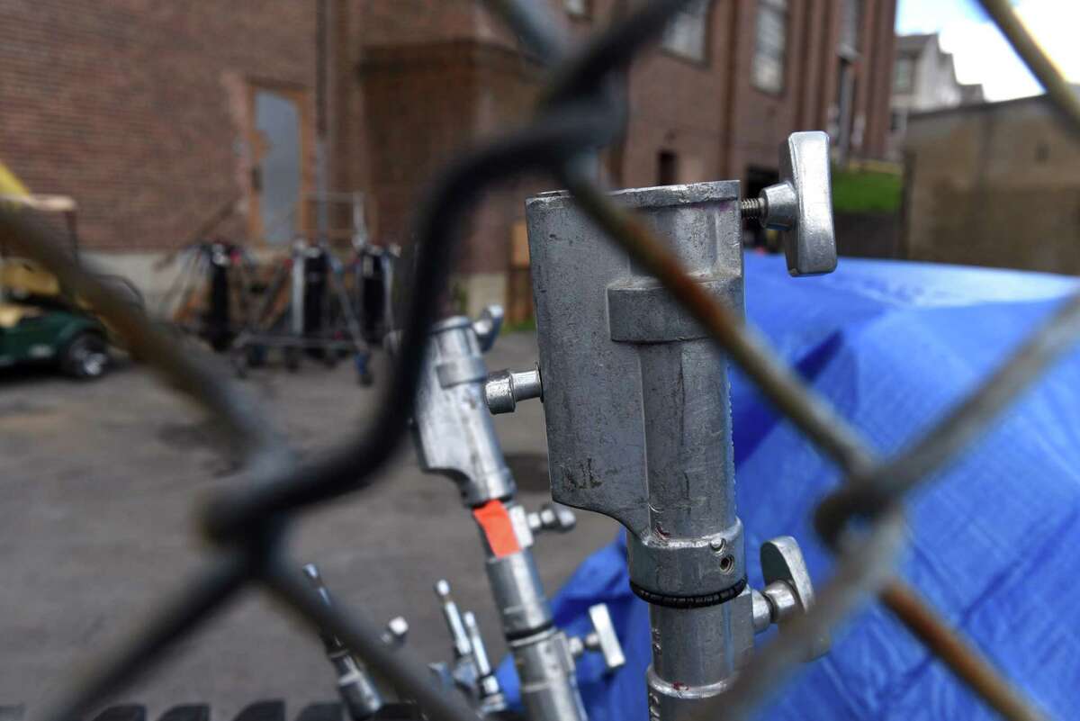 Movie lighting equipment is stored outside the Schenectady Armory where an Amazon Prime series called 