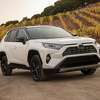 This photo provided by Toyota shows the 2020 Toyota RAV4 Hybrid. The RAV4 Hybrid is priced high enough on the used market that it's worth considering opting for new. (Courtesy of Toyota Motor Sales U.S.A. via AP)