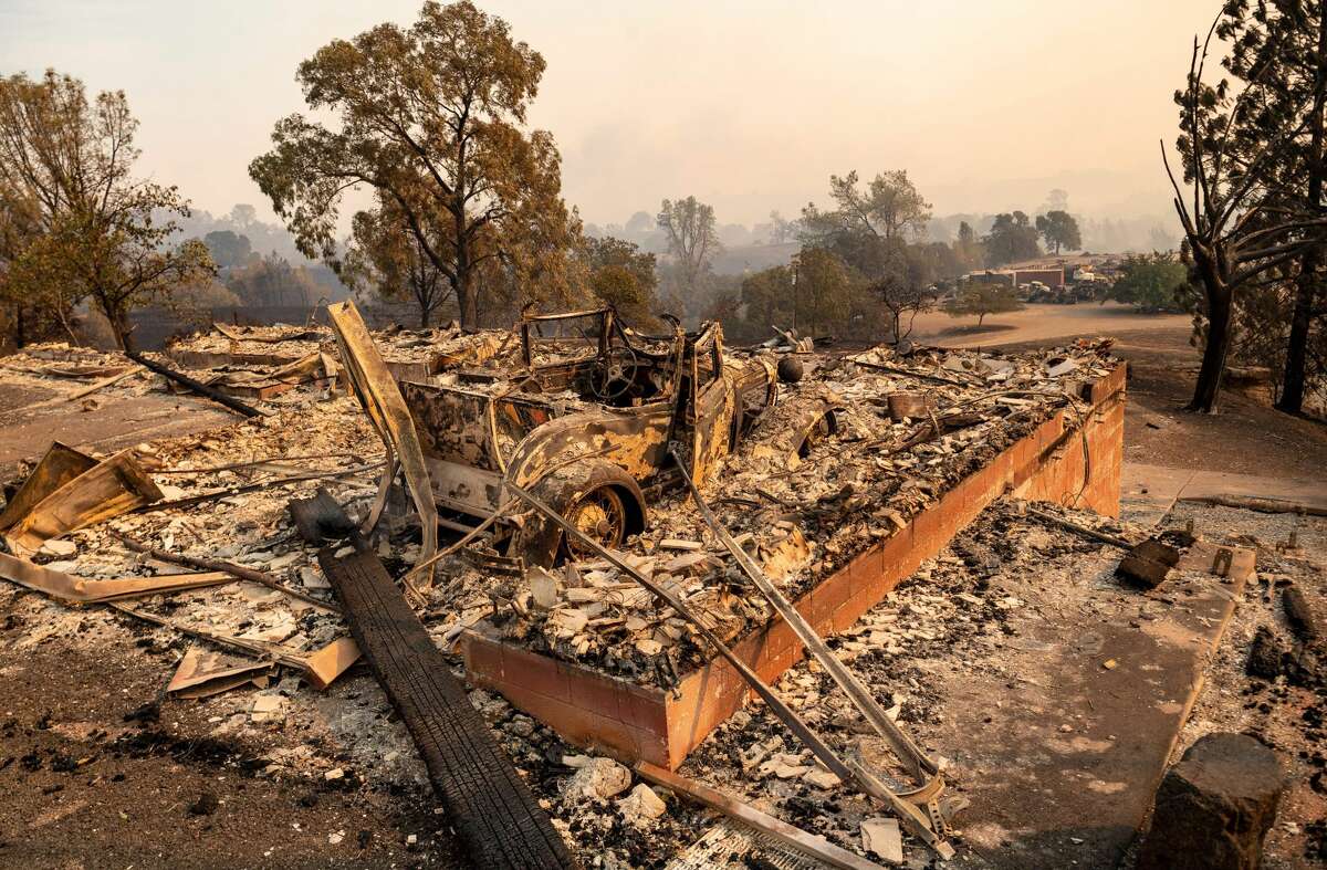 Fire crews 'fairly confident' they've stopped spread of destructive ...