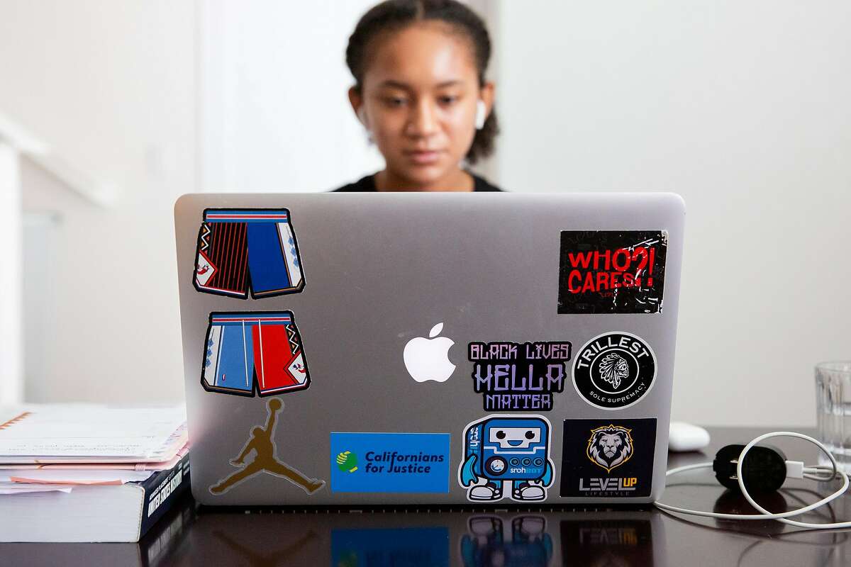A variety of stickers decorate the back of Aniyah Story's laptop at her home in San Leandro, Calif. on August 17, 2020. Story is an advocate for bill AB2016, which will make ethnic studies a graduation requirement for high school students. Currently lawmakers are divided over the bill, saying that while they agree ethnic studies should be expanded there is disagreement over what lessons the curriculum should include.