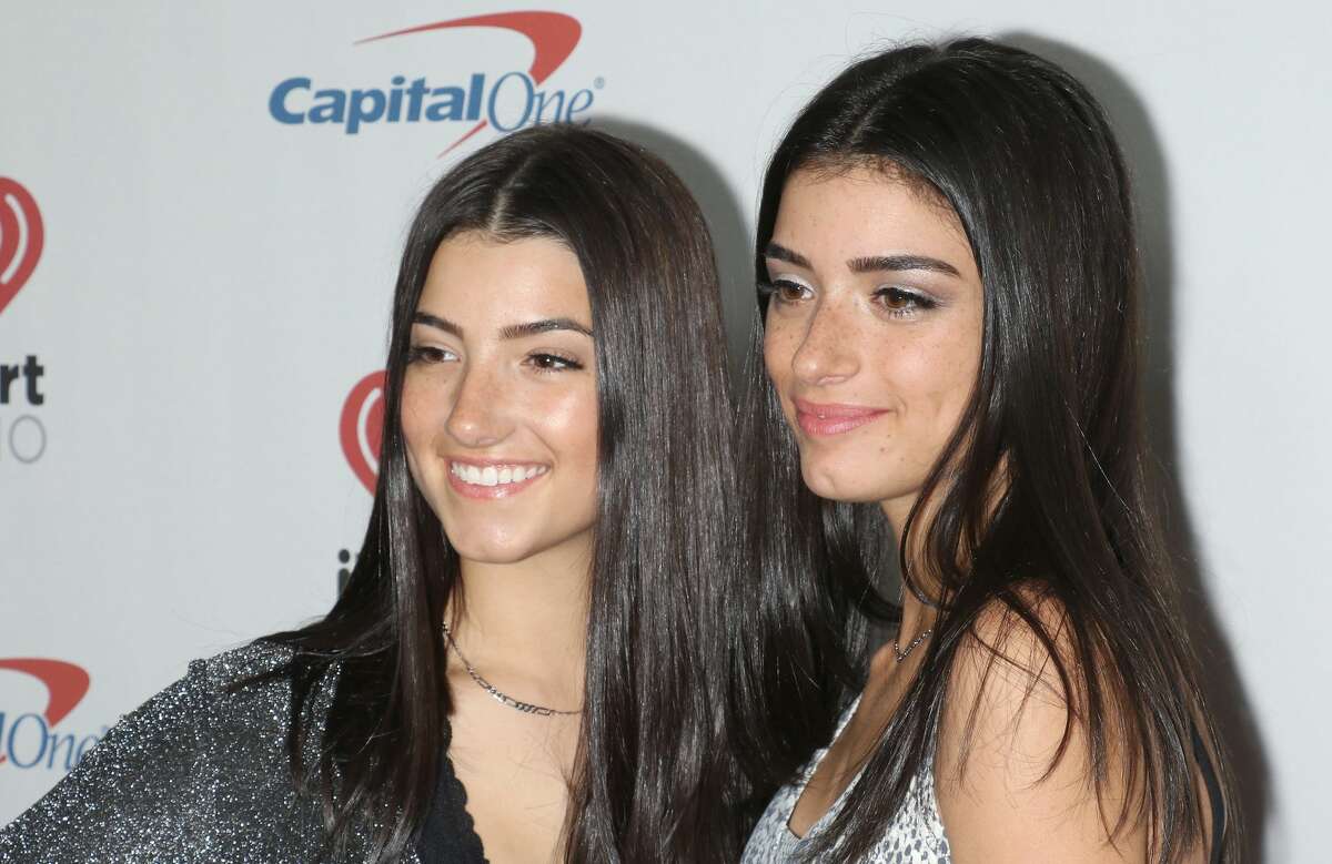 Charli D'Amelio (L) and Dixie D'Amelio arrive at iHeartRadio's Z100 Jingle Ball 2019 at Madison Square Garden on December 13, 2019 in New York City. She and her sister, Dixie, use their social media channels to raise awareness for cyberbullying. As an advocate against cyberbullying, Charli has partnered with organizations like UNICEF to raise awareness on the negative effects cyberbullying has on young adults. Controversy often goes hand in hand with fame. Just recently, a YouTube video featuring a D’Amelio family dinner they posted created a backlash from followers, seeing Charli lose nearly a million followers overnight. The backlash didn’t last long and within a few days, she not only regained but surpassed her numbers of followers to hit the 100 million mark. While Charli jokes that her years of dance training didn’t prepare her for her TikTok style of dancing, she is a passionate supporter of dance. To commemorate her TikTok milestone, she announced that $100,000 will be donated Dec. 1 to the American Dance Movement, an organization that works to improve access to dance education with ten dance schools in the country each receiving $10,000. In her videos, she not only stresses messages of living an authentic life but also embracing positivity. She has told followers, “I think I’m working on being a lot more positive in my everyday life because I realize comments and things can hurt.”