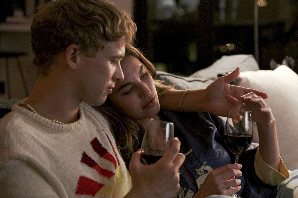 Tommy Dorfman, left, and Rainey Qualley in a scene from “Love in the Time of Corona,” a two-part series airing Aug.22 and 23 on Freeform, before it moves to Hulu.