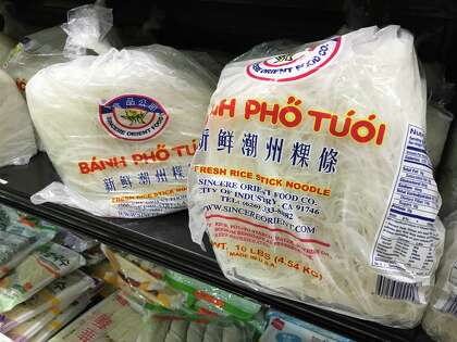 Fresh rice noodles for pho are available at Asia Supermarket in 10-pound bags.