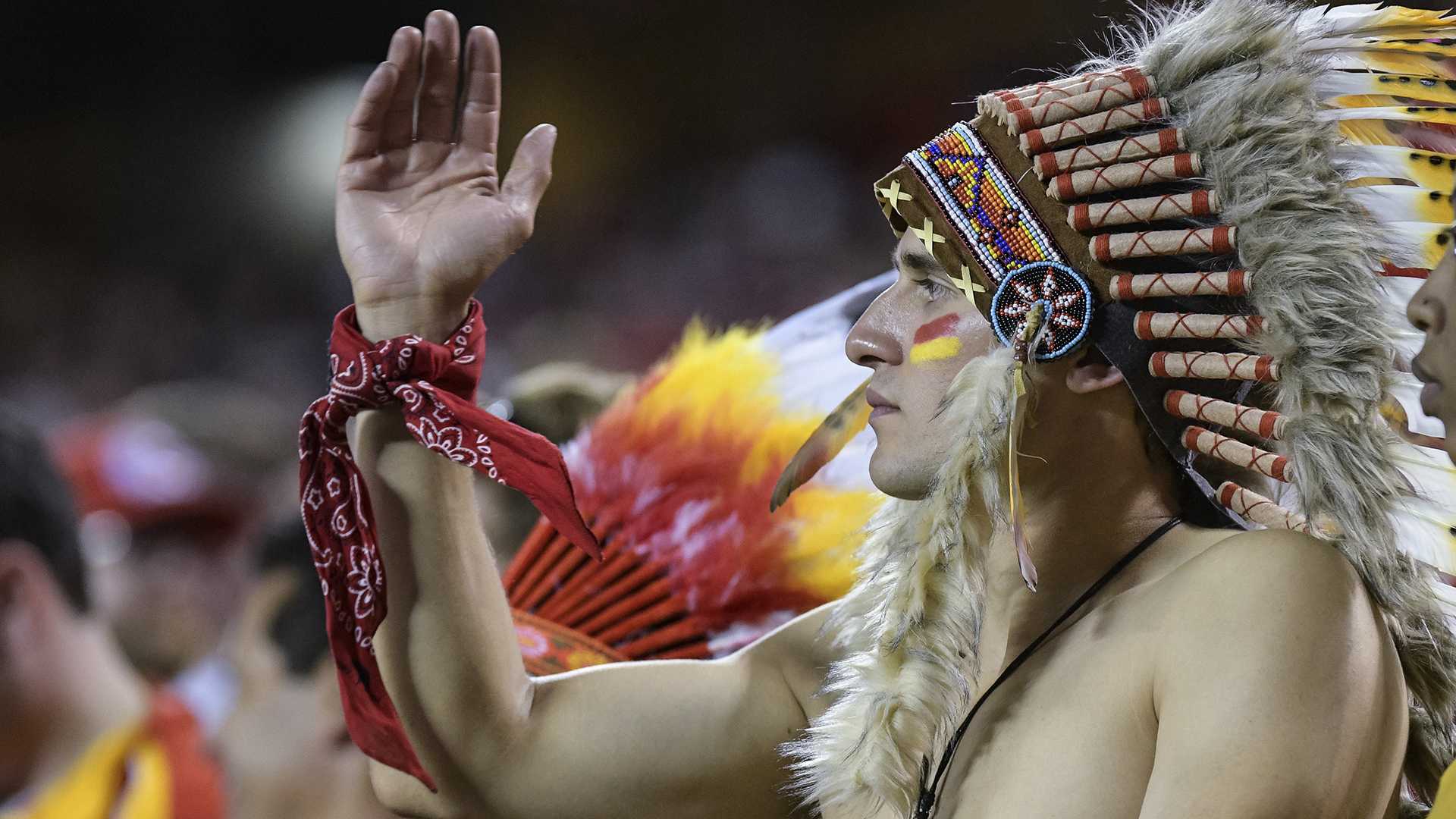 Kansas City Chiefs fans wear headdresses during the first half against the  Raiders in Kansas Ci …