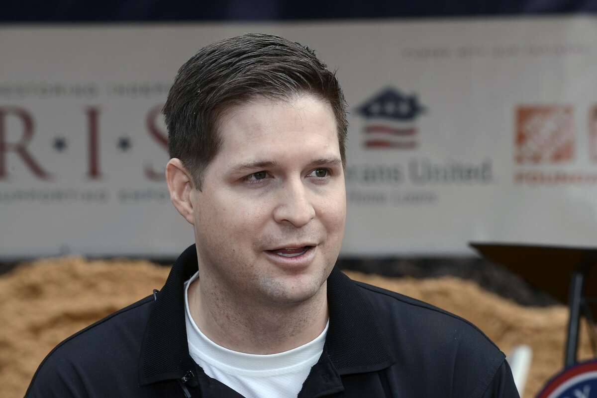 FILE - In this Jan. 14, 2016 photo, retired U.S. Air Force Sr. Airman Brian Kolfage speaks to the media during a groundbreaking ceremony for a new home he and his family were receiving through the Gary Sinise Foundation's RISE program at Sandestin, Fla. (Devon Ravine/Northwest Florida Daily News via AP, File)