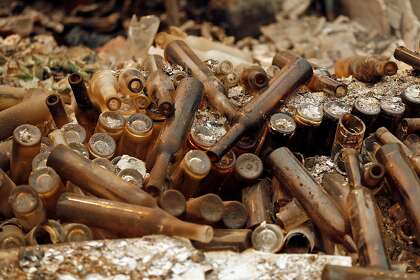 Bottles in destroyed tasting room and winemaking building at La Borgata Winery and Distillery after LNU Lightning Complex fire burned in Vacaville, Calif., on Thursday, August 20, 2020.