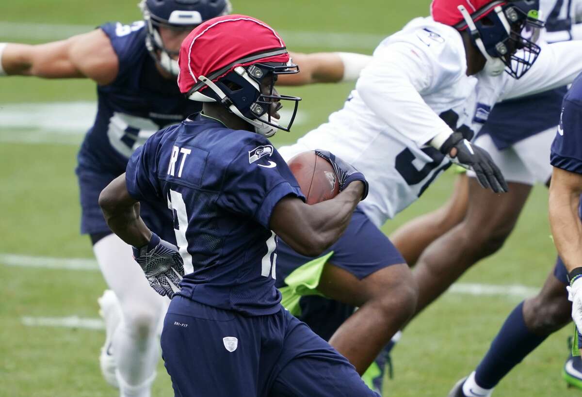 Seattle Seahawks wide receiver Penny Hart runs the ball during NFL football training camp, Thursday, Aug. 20, 2020, in Renton, Wash. (AP Photo/Ted S. Warren)
