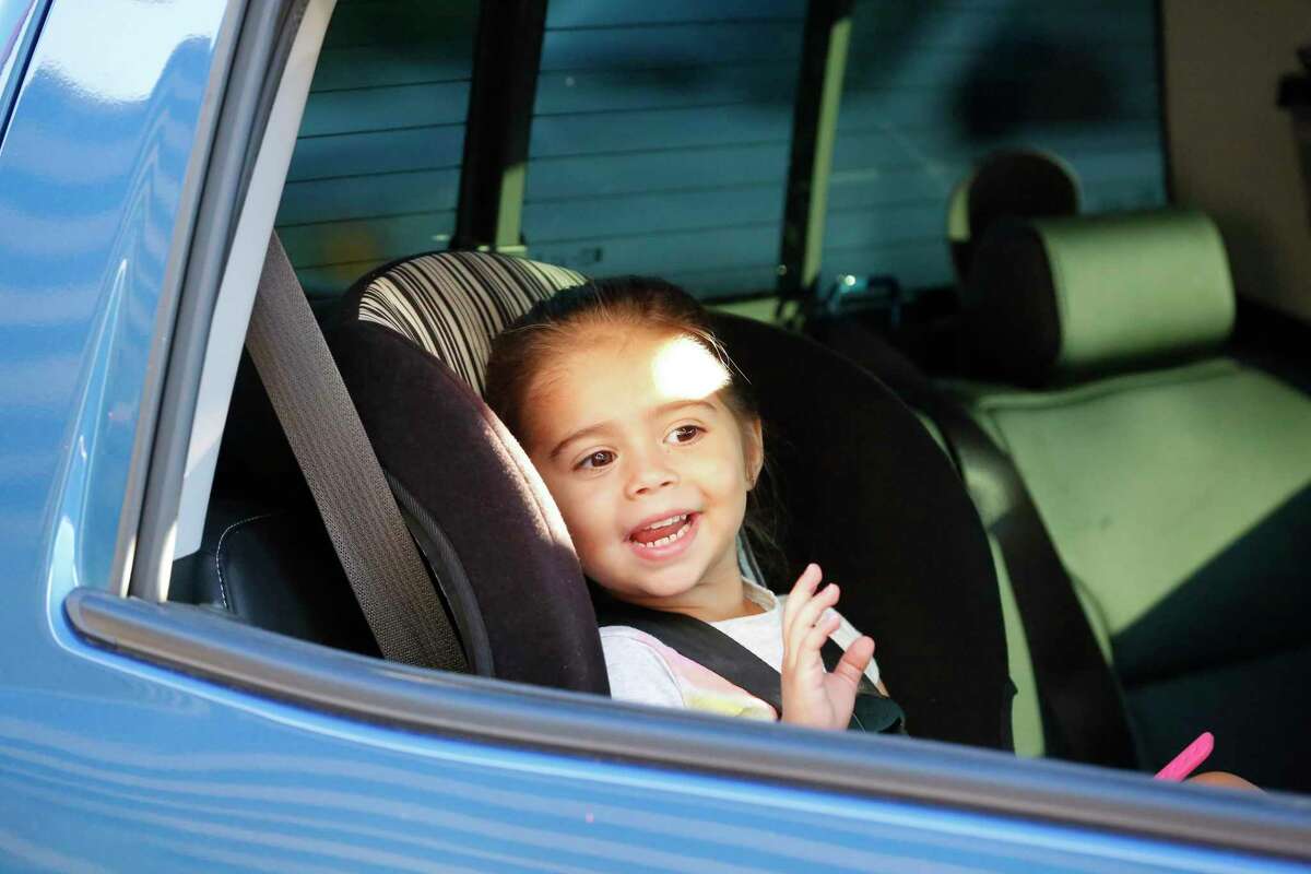 Students and parents waved and enjoyed meeting their teachers during a car parade for pre-K pupils and kindergarteners at Stafford MSD's Early Childhood Center Wednesday, Aug. 19, 2020, in Stafford. Students met their teachers from social distance of their cars.