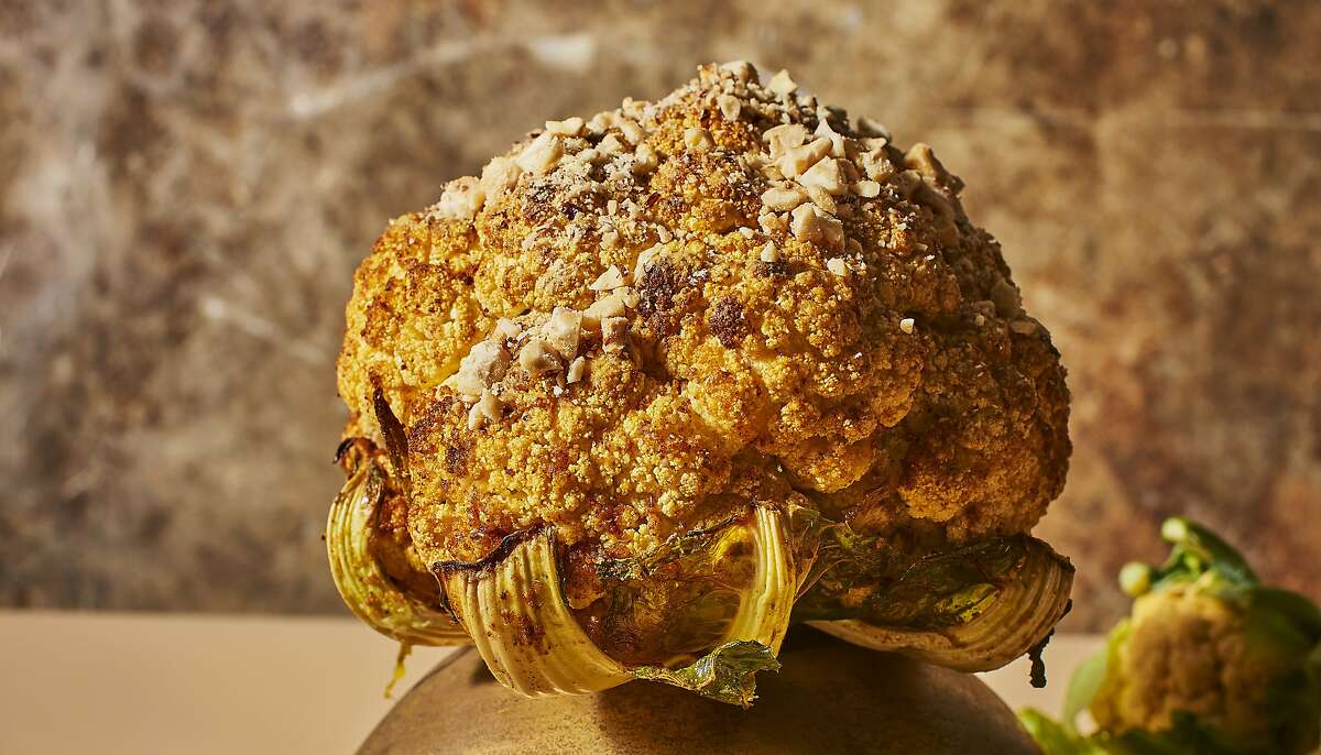 Whole Roasted Cauliflower With Turmeric Butter from "Nourish Me Home" by Cortney Burns. (Cropped photo just for social media use.)