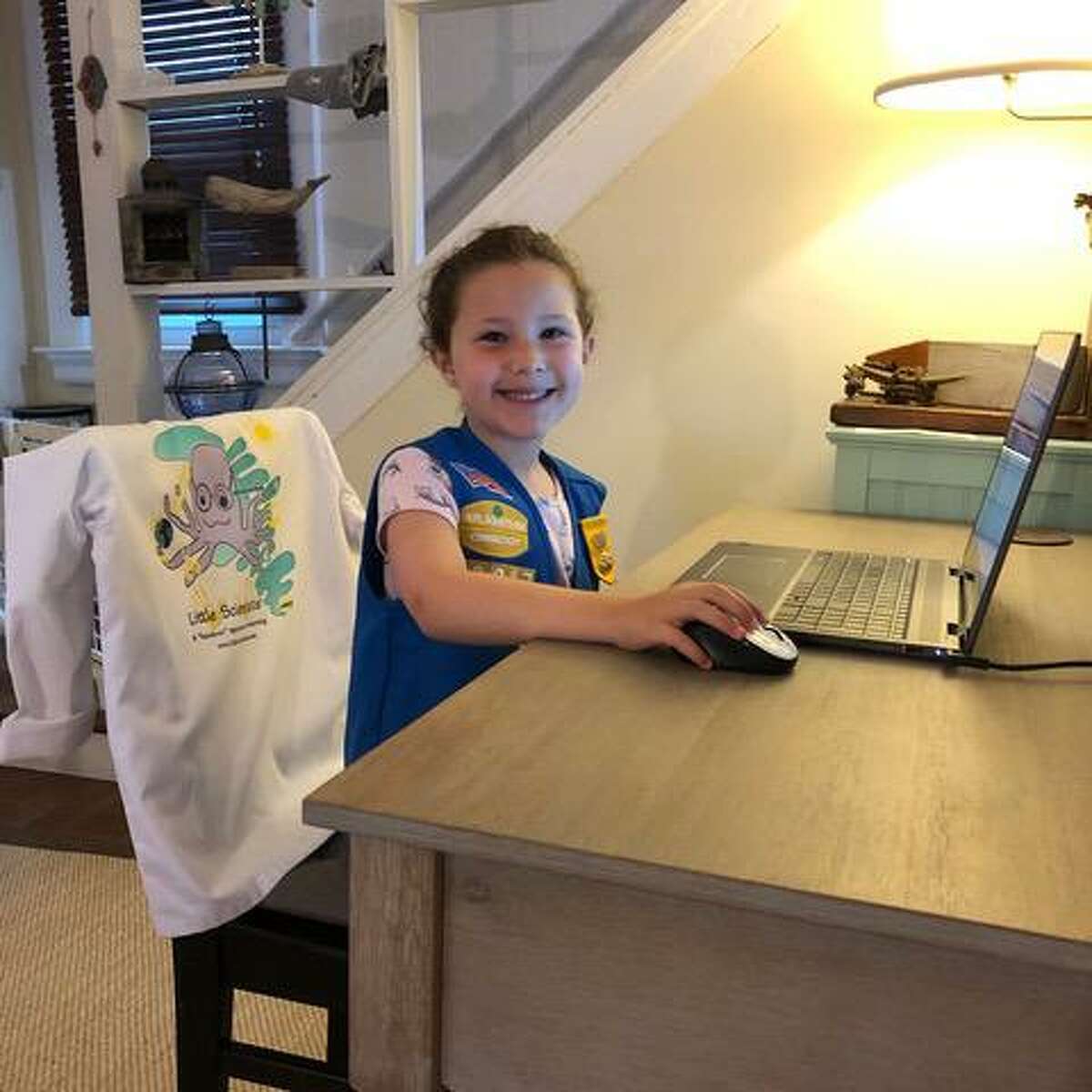 Girl Scout Emma participates in a Little Scientists Coding course.