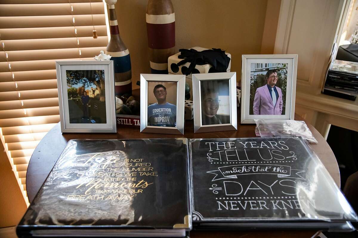 Photos and scrapbooks of Seth Smith at his home in Clarksburg, Calif, on Monday, August 10, 2020. Seth Smith, a 19-year-old UC Berkeley student, was killed in Berkeley, Calif. on June 15, 2020. Two months and a $50,000 reward later, police still don't have a suspect and his traumatized parents are searching for answers as they help Seth's younger sister prepare to start college.