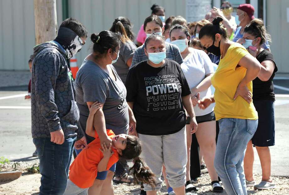 “It’s so diverse if you stop and chat with someone on the street, you never know where people will be from,” said Phil Anderson, executive director of the Cactus Nazarene Ministry Center, which distributes food to locals once a week. / ©2020 San Antonio Express-News