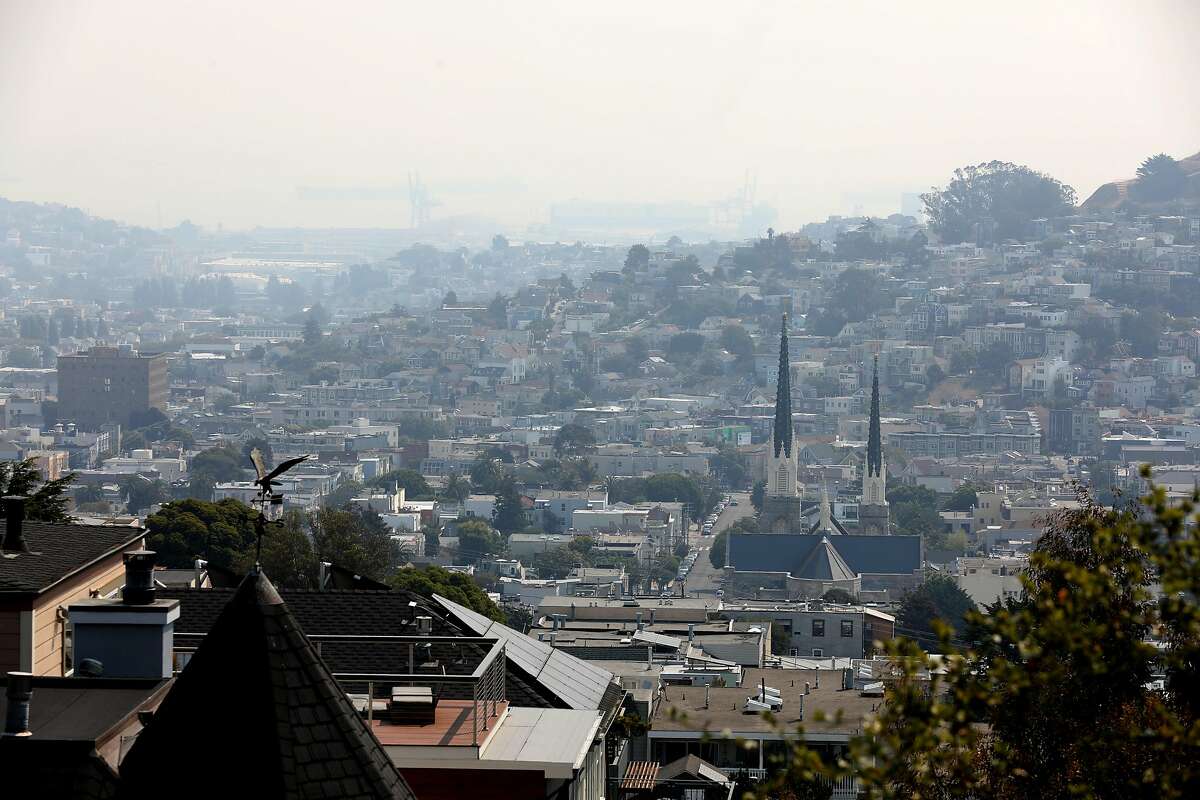 Wildfire smoke covers the skies seen looking toward Noe Valley from Valley at 29th streets on Aug. 19, 2020, in San Francisco.