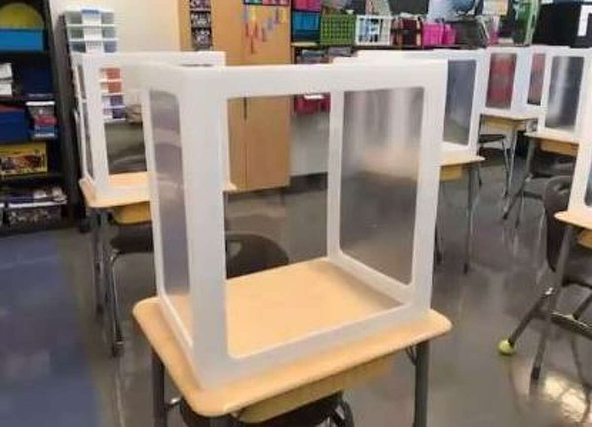 Desks outfitted with plexiglass have been installed in classrooms in elementary schools in Greenwich. They will be decorated by teachers and students when classrooms reopen for in-person instruction next month.