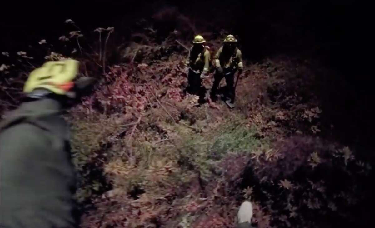 Two firefighters in Marin County battling the Woodward Fire were rescued by helicopter.