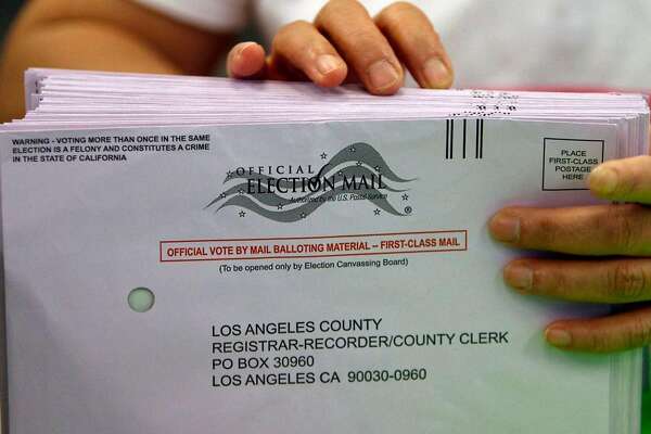 Nancy Fulton, a clerk, sorts vote by mail ballots in preparation for a vote tally at the Los Angeles County Registrar's office in Norwalk, California, on November 4, 2010. (Allen J. Schaben/Los Angeles Times/TNS)