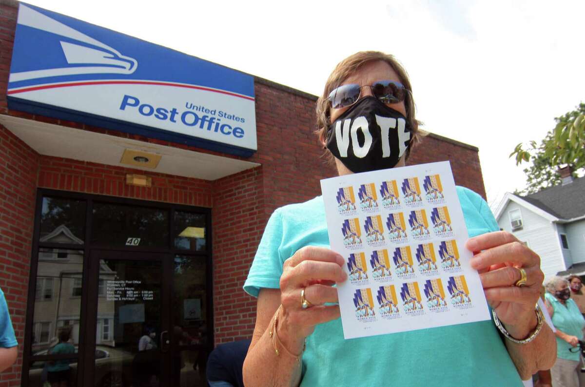 Allie Perry takes part in a rally to support the USPS at the Whitneyville Post Office in Hamden, Conn., on Saturday Aug. 22, 2020. About 40 people came out in support of US Postal Service as part of a nationwide "Save the Post Office" initiative. 1. Reporters from 10 daily and weekly newspapers across the Hearst Connecticut Media Group sent more than 300 letters to editors’ homes across the state and nearly 100 to town clerks in 16 communities – Bridgeport, New Haven, Greenwich, Stamford, Danbury, Norwalk, Darien, Ansonia, New Fairfield, Wilton, Milford, Fairfield, Guilford, Middletown, Torrington and Ridgefield. The letters were sent on three days during the week of Sept. 14 to 18.