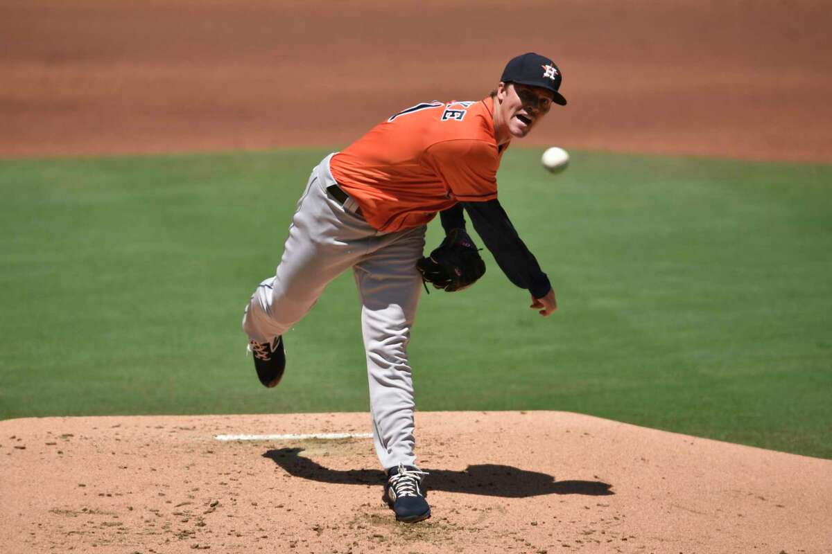 Houston Astros starting pitcher Zack Greinke delivers a pitch during the first inning of a baseball game against the San Diego Padres in San Diego, Sunday, Aug. 23, 2020. (AP Photo/Kelvin Kuo)