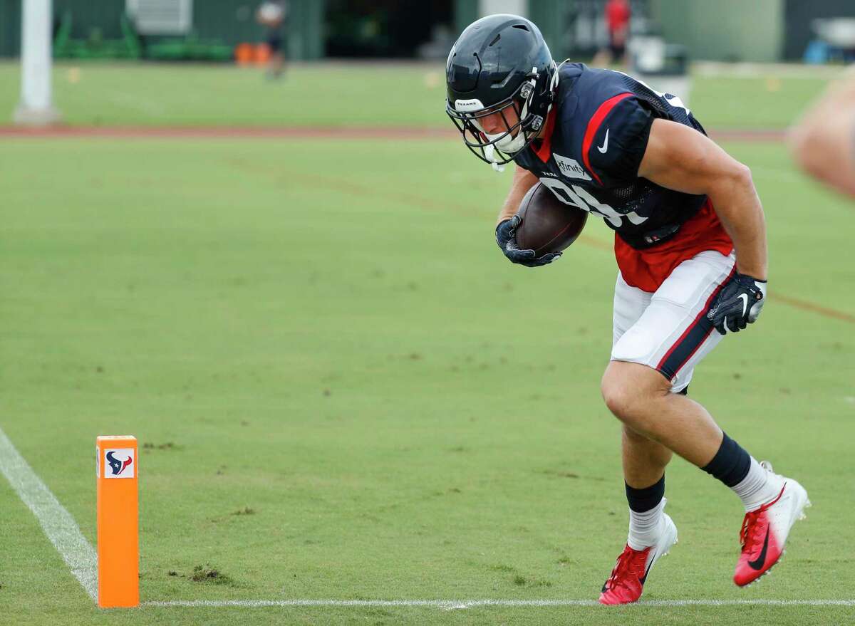 Houston Texans tight end Kahale Warring (81) makes a catch during an NFL training camp football practice Monday, Aug. 24, 2020, in Houston.