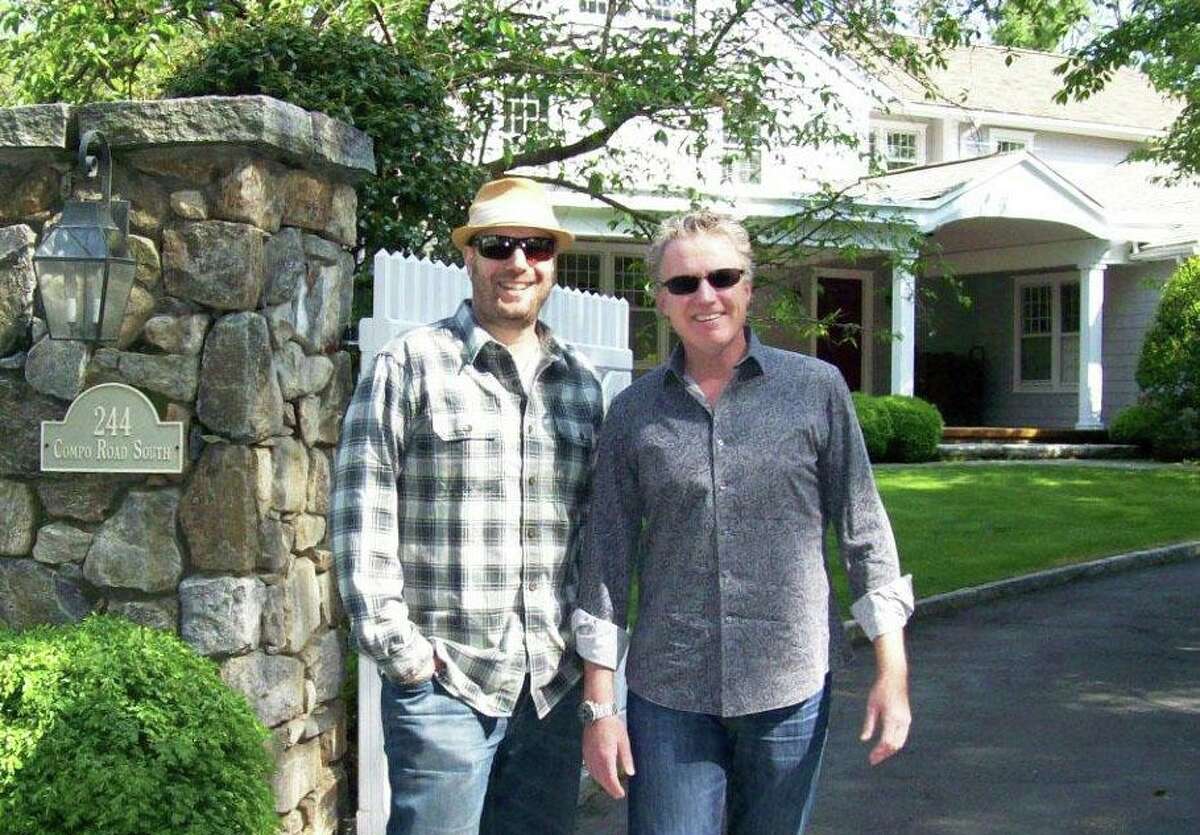 Robert Steven Williams, left, and Deej Webb will release their documentary “Gatsby in Connecticut: The Untold Story” on Sept. 1. Williams and Webb stand in front of the Compo Road South house where Fitzgerald and his wife, Zelda, lived from May until early October 1920.