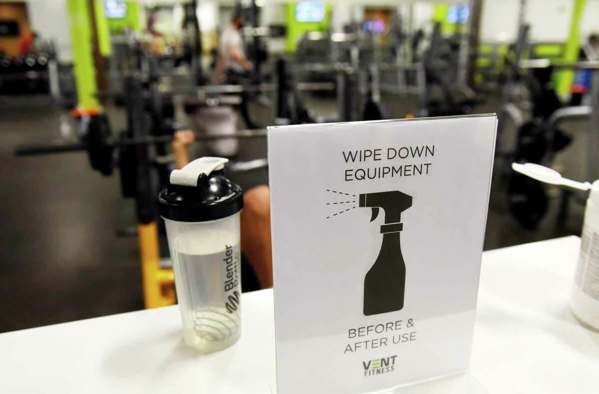 Gym equipment cleaning is asked of users at Vent Fitness on Monday, Aug. 24, 2020, in Guilderland, N.Y. New York gyms reopened Monday under the state's coronavirus reopening plan. (Will Waldron/Times Union)
