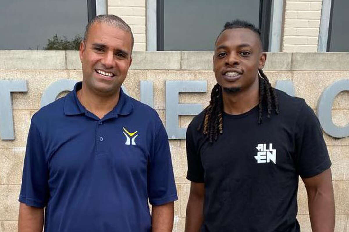 Justin Allen, right, is with Yellowstone Academy director of campus services Damon Gunn, said his personal experiences drove his decision to donate school supplies to Third Ward students.