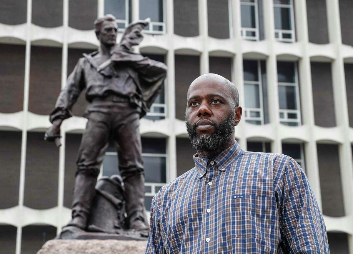 Isaac Fanuiel IV, who is advocating for a Confederate statue called the "Dignified Resignation" statue to be removed from in front of the Galveston County courthouse, is shown on Friday, June 26, 2020, in Galveston. A motion to remove the statue did not receive a second at a meeting of the county commissioners on Aug. 24, 2020 and died.