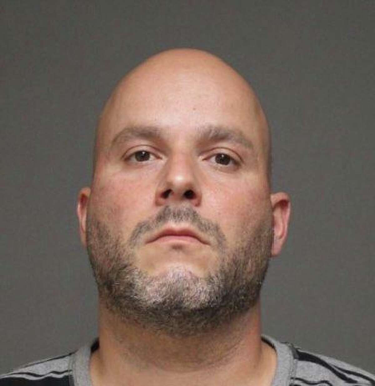 Steven Botelho, a 38-year-old Bridgeport resident, has been arrested for allegedly causing a large fire near the Metro North train tracks with illegal fireworks, according to police.