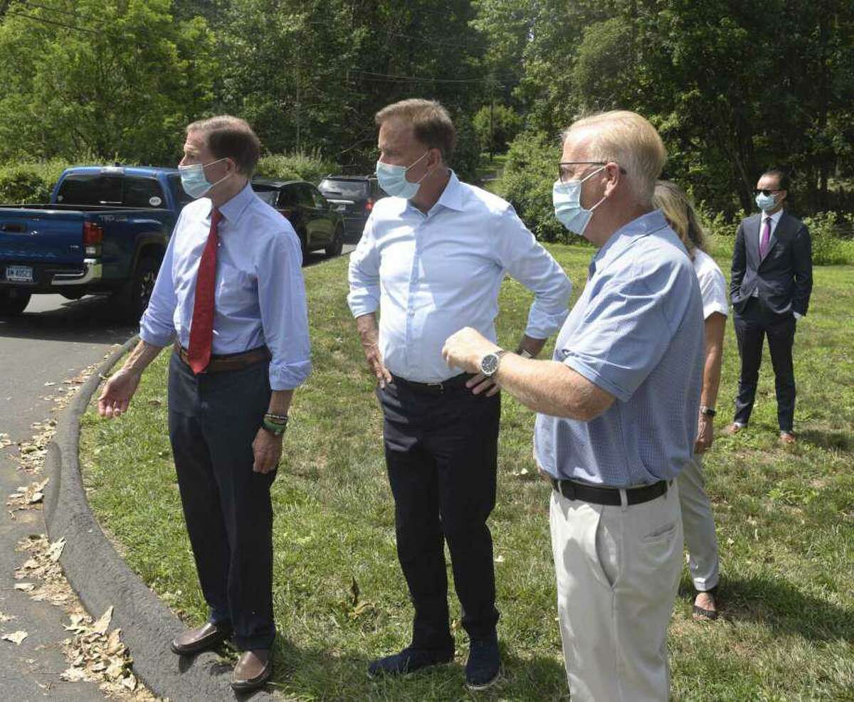 U.S. Sen. Richard Blumenthal, Gov. Ned Lamont and Mayor Mark Boughton (L-R), assessing power restoration efforts in August 2020 in Danbury, Conn., where hundreds of Eversource customers remained without electricity a week after Tropical Storm Isaias.
