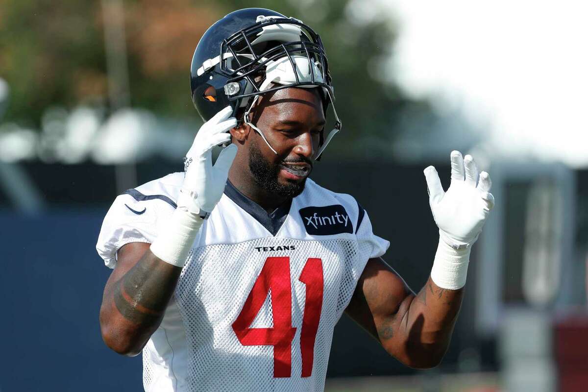Houston Texans linebacker Zach Cunningham warms up during an NFL training camp football practice Tuesday, Aug. 25, 2020, in Houston.