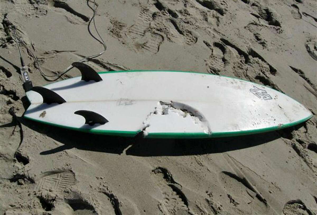 This photo released by the Santa Barbara County Sheriff's Department shows the surfboard being ridden by 39-year-old surfer Francisco Javier Solorio Jr., who was fatally attacked by a shark Tuesday, Oct. 23, 2012. An expert has determined that Solorio was killed by a 15- to 16-foot great white shark, according to Ralph Collier of the Shark Research Committee. He was bitten in the upper torso in the waters off Surf Beach on Vandenberg Air Force Base in Santa Barbara County and died at the scene despite a friend's efforts to save him. (AP Photo/Santa Barbara County Sheriff)
