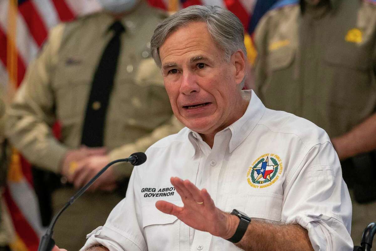 Governor Greg Abbott gives an update on the state?•s response to Tropical Storm Marco at the Alternate State Operations Center in Austin, Sunday, Aug. 23, 2020. (Stephen Spillman / for Express-News)