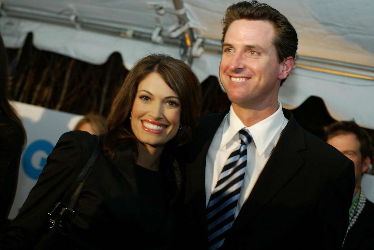 A different era: San Francisco Mayor Gavin Newsom and his wife Kimberly Guilfoyle arrive at the GQ magazine party at the Democratic National Convention in 2004.