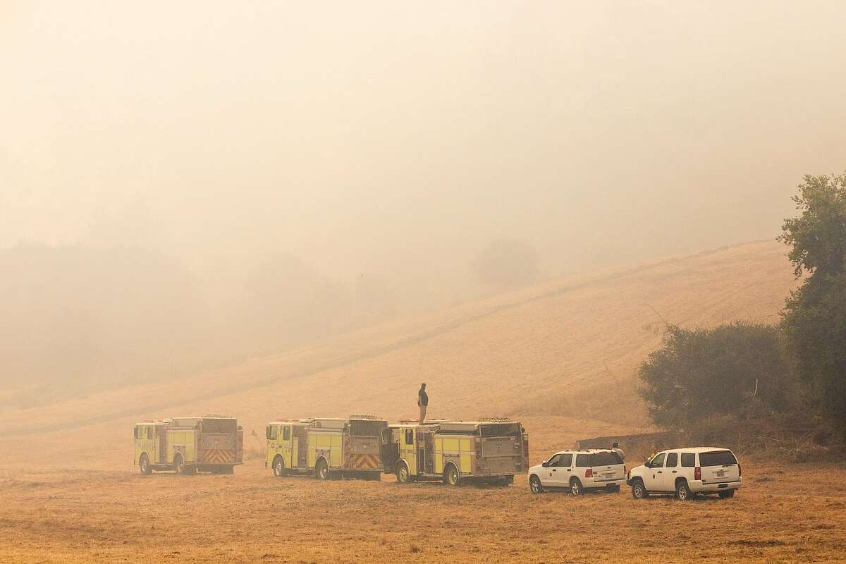 Heavy smoke gathers in the valley of Bear Valley Visitors Center in Olema, Calif. Tuesday, August 25, 2020. Firefighters are working to hold the eastern fire line near Bear Valley Visitors Center and northern line south of Limantour Road. The Woodward Fire stands at 2,739 acres and is 5% contained as of Tuesday.