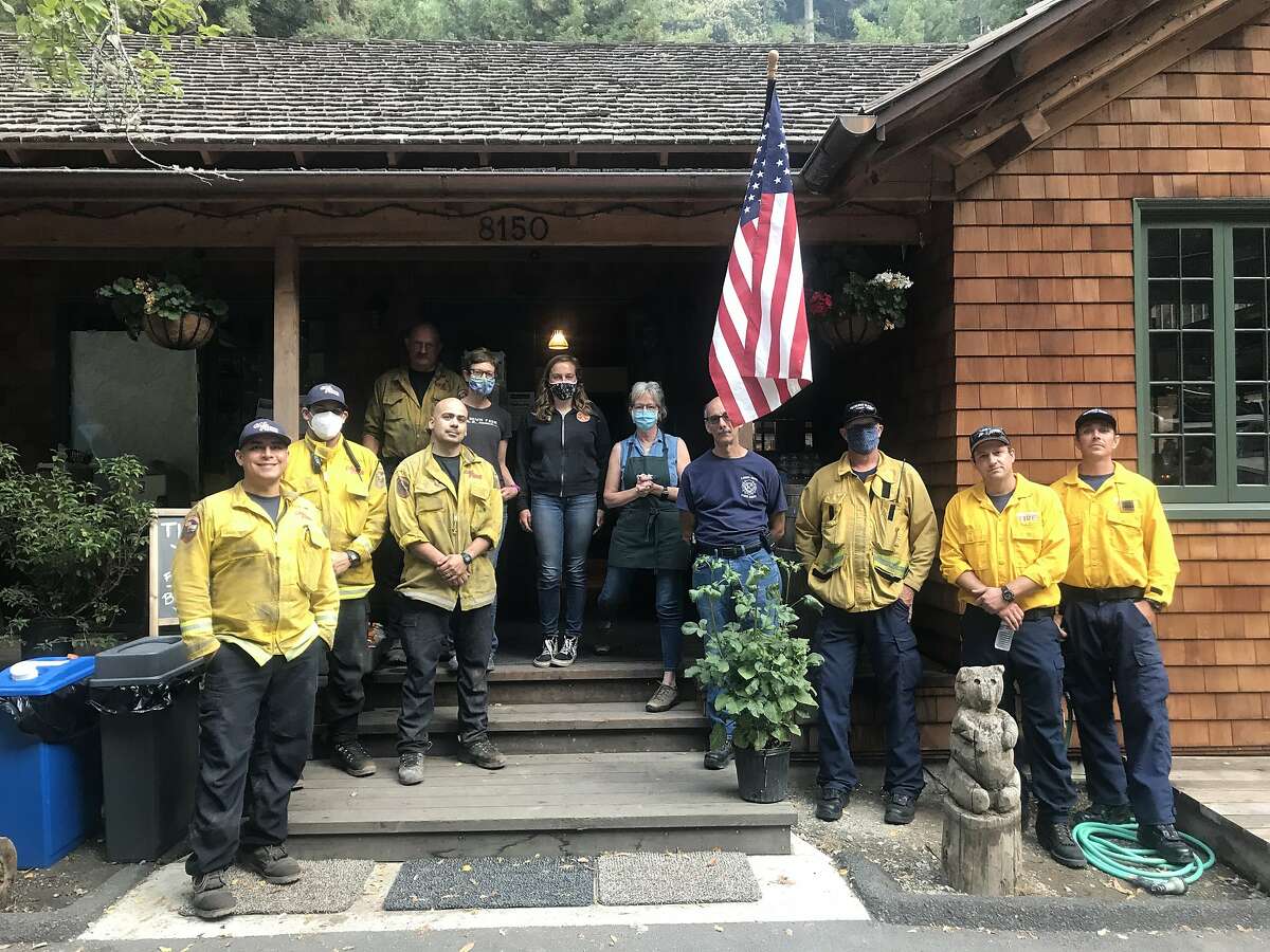 Loma Mar Store, a general store in the small town, remains open as a home base for firefighters and other first responders fighting the CZU Lightning Complex.