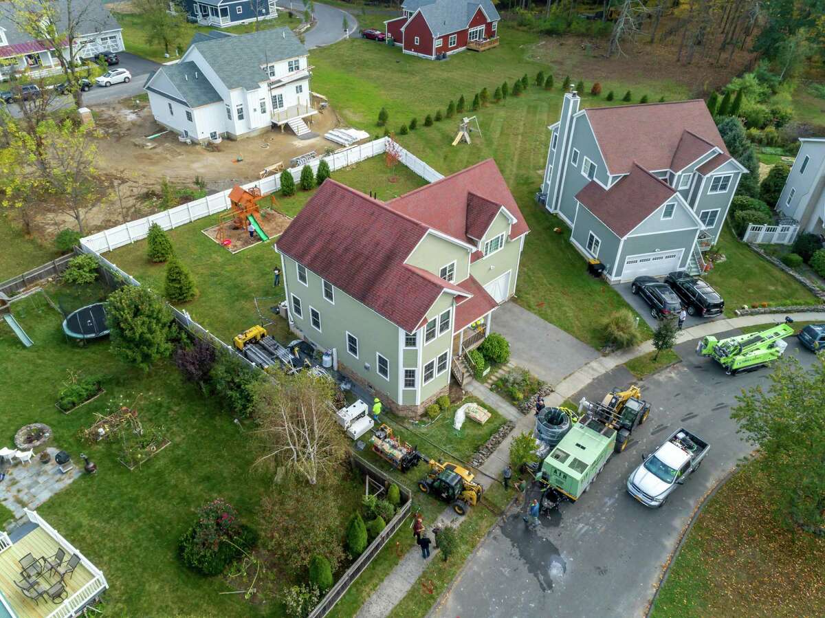 An overhead shot of a house with a Dandelion Energy geothermal system.