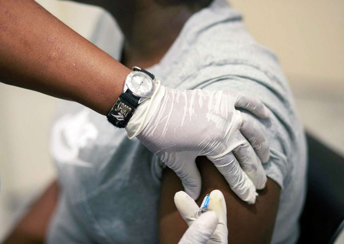 Sisi Ndebele, receives a seasonal influenza vaccine from a nurse at a local pharmacy clinic in Johannesburg, South Africa on Friday, April 24, 2020. Meanwhile, a Gallup poll from earlier this month showed that one third of the U.S. population would refuse to be vaccinated. As Pitzer said, if only 66 percent of the population agrees to get the shot, it has to be 100 percent effective to result in herd immunity. Add to all of that the fact that reinfection after immunity is a real thing. Immunity from the coronavirus, granted either by vaccine or the old fashioned way (you know, actually catching the thing) might only last a few months, a season, a year if we’re lucky. One may conclude, then, that as in all the best stories we can’t simply wait for a knight to rescue us from the dragon. We’ll have to be brave, gird ourselves with the sword of knowledge (sorry about that) and rescue ourselves.