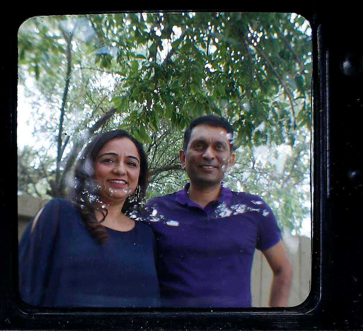 Richa (left) and Rahul Kapoor, who were brought together through an arranged marriage, at their home in San Jose.